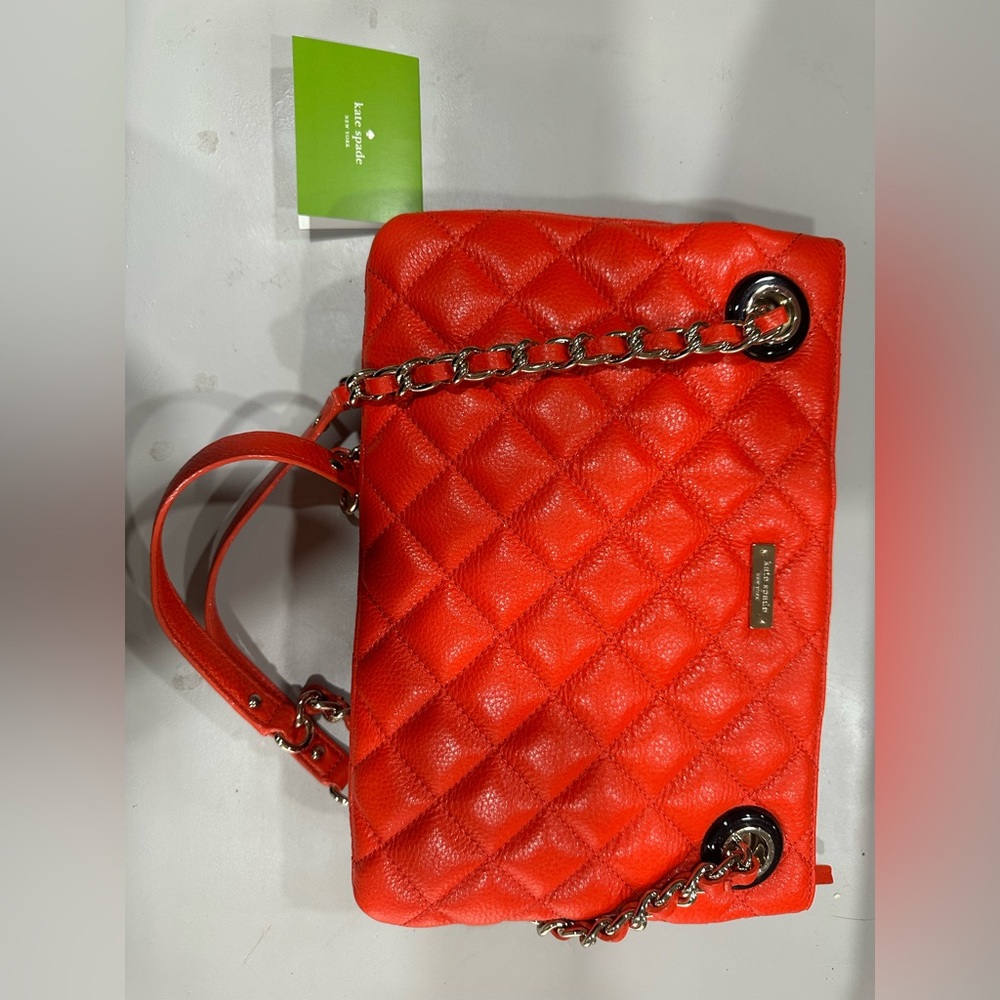 KATE SPADE GOLD COAST LEIGHTON 
QUILTED COWHIDE CHAIN MARASCHINO RED